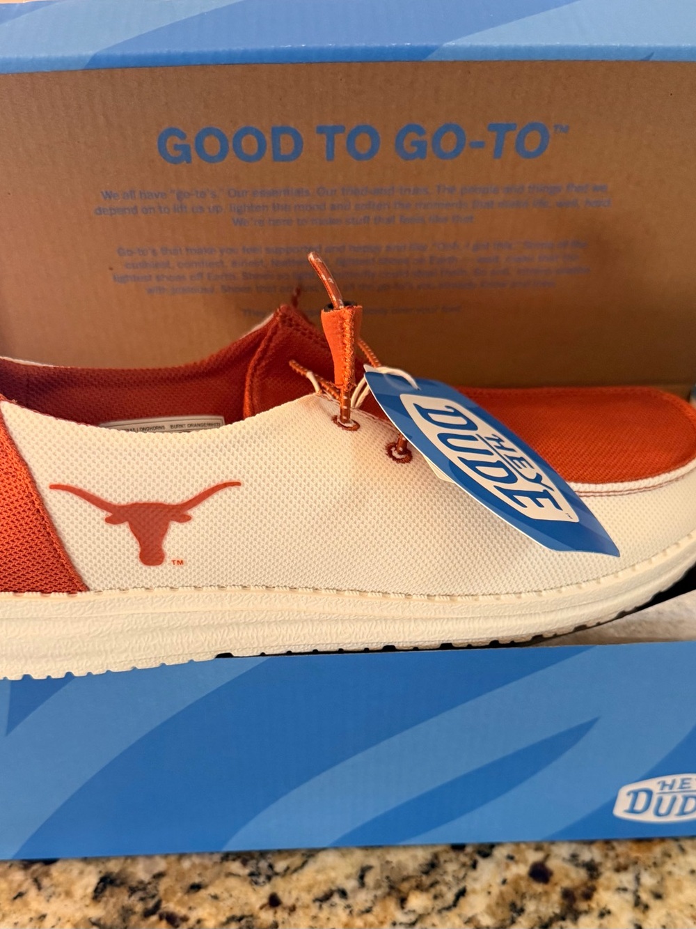 NWT Hey Dude Women’s Slip-On Shoe in White and Orange with Longhorn Logo